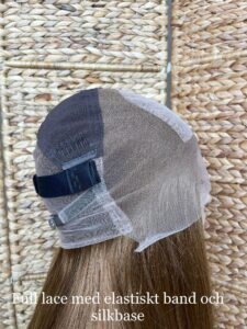 Perukdetalj eller färgexempel från Indigos Hairs perukguide