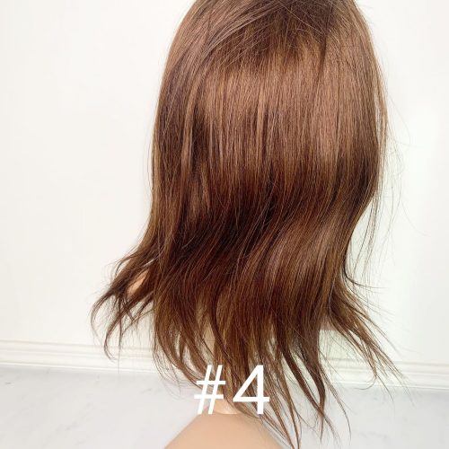 Perukdetalj eller färgexempel från Indigos Hairs perukguide